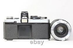 Olympus OM-2N Film Camera Black Film Back Silver 75-150mm F/4 Lens