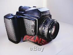 Pentax 645 medium format film camera with 75mm f/2.8 lens + back