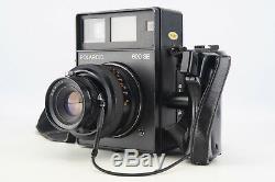 Polaroid 600SE Instant Film Camera with Mamiya 127mm f/4.7 Lens Grip Back V06